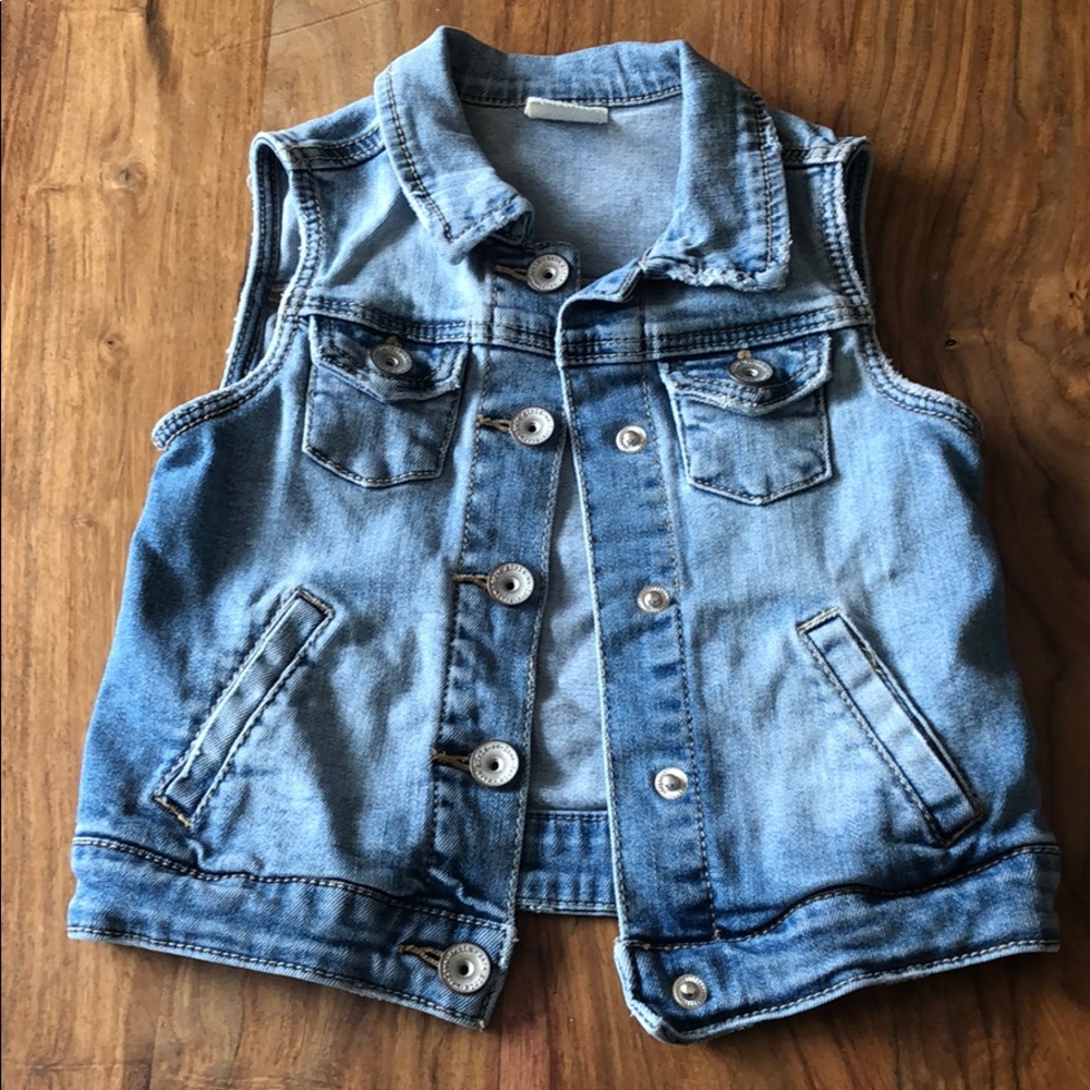 Toddler girls jean vest.Distressed light-med wash.